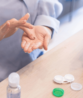 Rubbing the lenses with solution